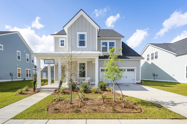modern inspired farmhouse featuring board and batten siding, a porch, driveway, a front lawn, and a shingled roof