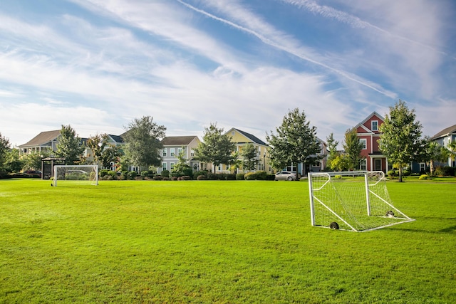 view of property's community featuring a sport area