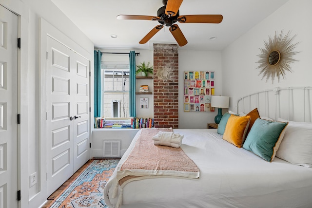 170 Spring St, Charleston, SC 29403 - bedroom featuring wood finished floors, a closet, and ceiling fan