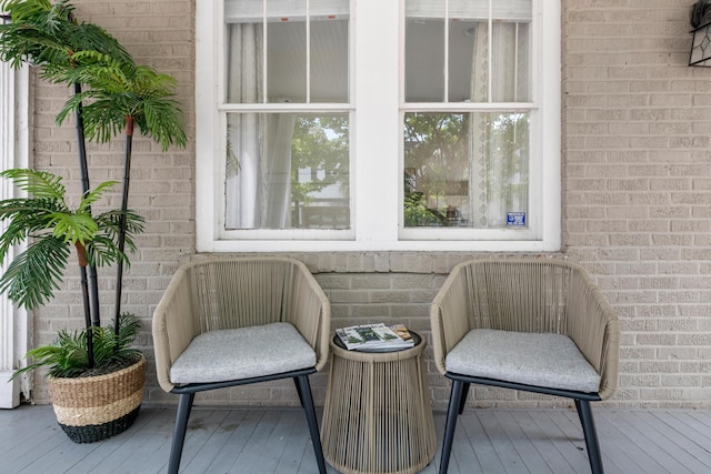 170 Spring St, Charleston, SC 29403 - exterior space with wood-type flooring and brick wall