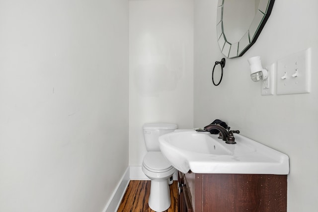 170 Spring St, Charleston, SC 29403 - half bathroom featuring wood finished floors and vanity