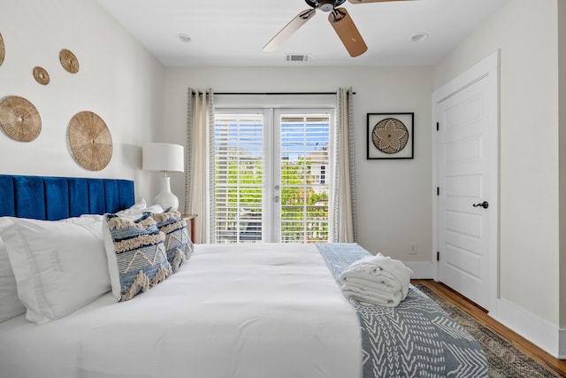 170 Spring St, Charleston, SC 29403 - bedroom featuring access to exterior, wood finished floors, and a ceiling fan