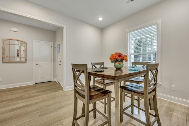 dining room featuring light hardwood / wood-style floors