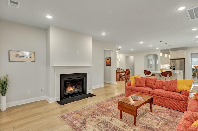 living room with light wood-type flooring