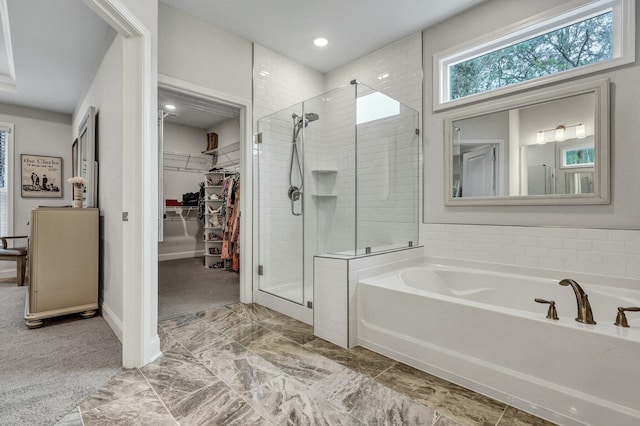 bathroom with independent shower and bath