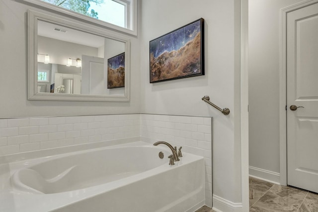 bathroom featuring a bathtub