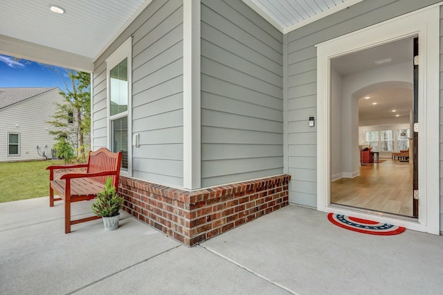 entrance to property with a porch