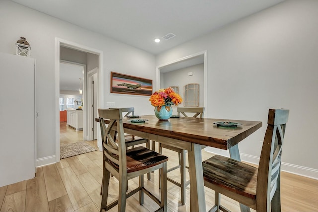 dining area featuring light hardwood / wood-style floors