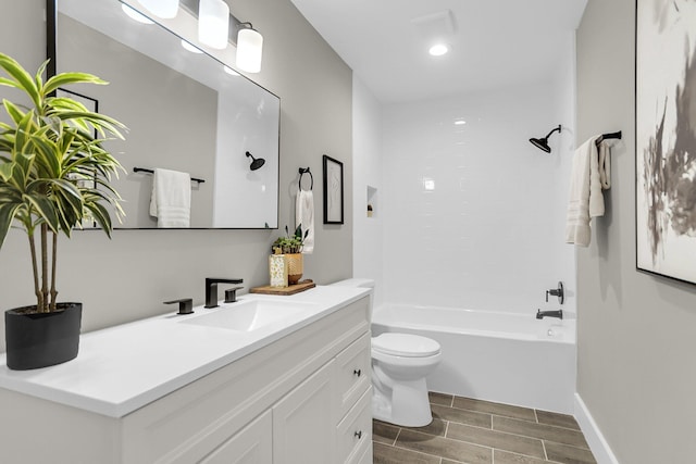 6305 Lucille Dr, North Charleston, SC 29406 - bathroom with vanity, wood finish floors, toilet, and shower / bathtub combination