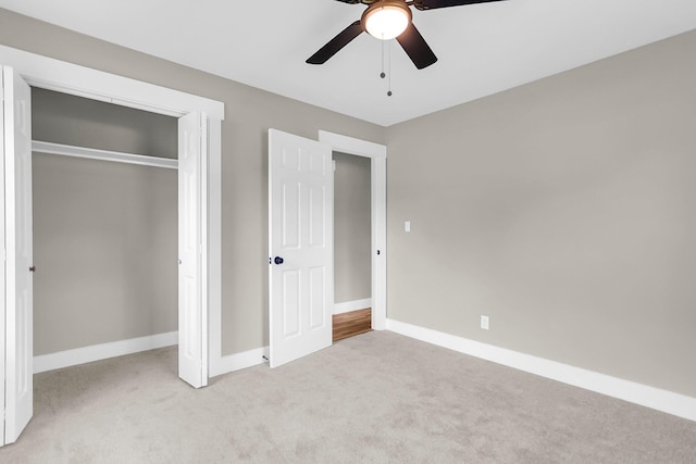 6305 Lucille Dr, North Charleston, SC 29406 - unfurnished bedroom with light carpet, baseboards, a closet, and ceiling fan