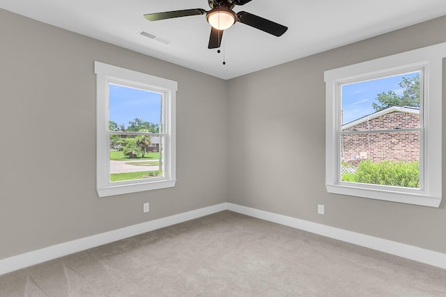 6305 Lucille Dr, North Charleston, SC 29406 - carpeted spare room with healthy amount of natural light, baseboards, and a ceiling fan