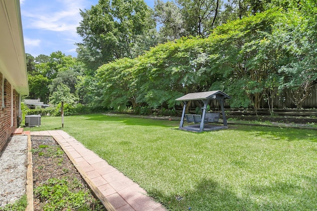 6305 Lucille Dr, North Charleston, SC 29406 - view of grassy yard featuring a gazebo and central AC