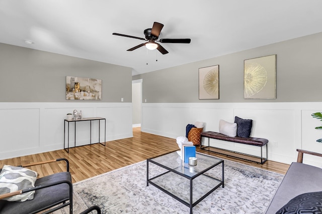 6305 Lucille Dr, North Charleston, SC 29406 - living room with a wainscoted wall, a ceiling fan, wood finished floors, and a decorative wall