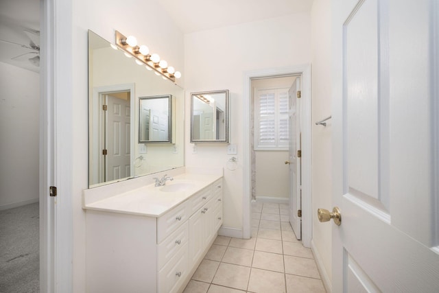 bathroom with vanity, tile patterned floors, and ceiling fan