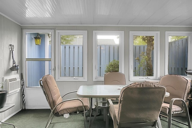 sunroom / solarium with a wealth of natural light and cooling unit