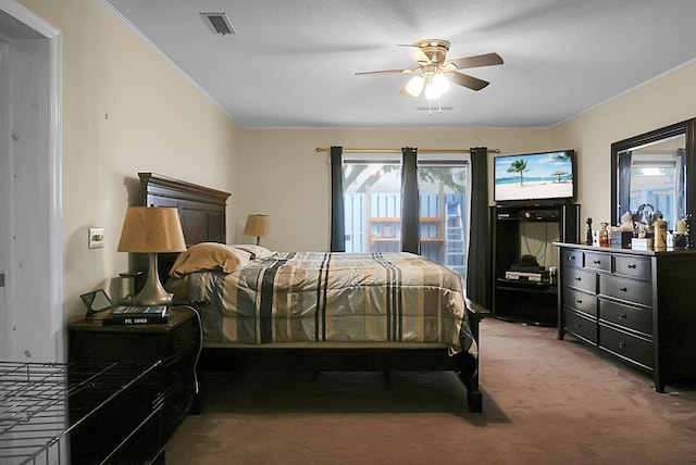 bedroom with carpet floors, crown molding, visible vents, and a ceiling fan