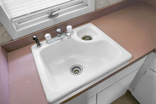 room details with sink and tile patterned floors