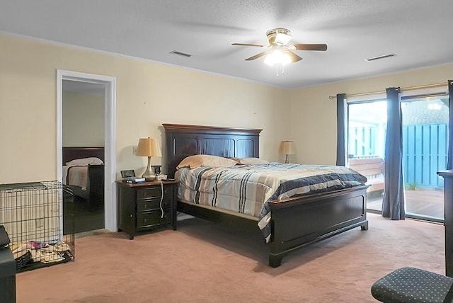 carpeted bedroom with access to exterior and ceiling fan