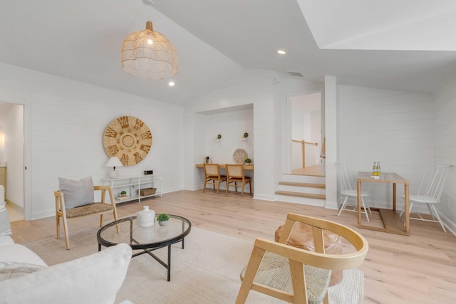 7053 Schooner St, Daniel Island, SC 29492 - living room featuring stairway, wood finished floors, vaulted ceiling, and recessed lighting
