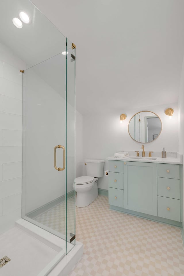 7053 Schooner St, Daniel Island, SC 29492 - bathroom featuring tile patterned floors, vanity, a shower stall, toilet, and baseboards