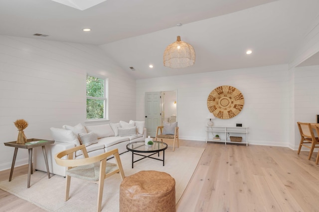 7053 Schooner St, Daniel Island, SC 29492 - living room featuring light wood finished floors, lofted ceiling, recessed lighting, and baseboards