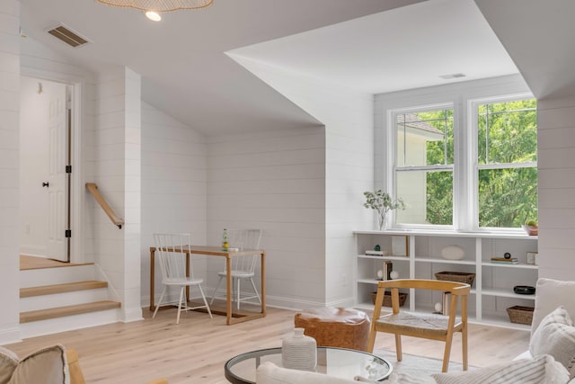 7053 Schooner St, Daniel Island, SC 29492 - living area featuring wood finished floors and lofted ceiling