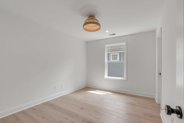 7053 Schooner St, Daniel Island, SC 29492 - spare room with baseboards, light wood finished floors, and recessed lighting