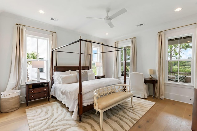 3023 Eventide Dr, Johns Island, SC 29455 - bedroom featuring multiple windows, wood finished floors, ceiling fan, baseboards, and recessed lighting