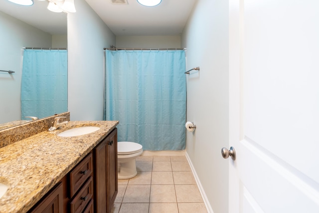 7217 Mossy Creek Ln, Hanahan, SC 29410 - bathroom with vanity, toilet, tile patterned floors, and baseboards