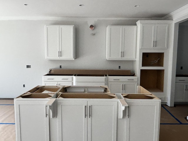 kitchen featuring white cabinetry and a kitchen island