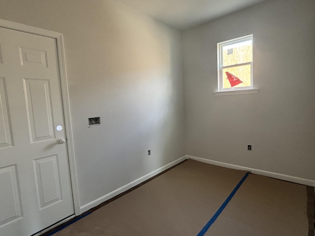 empty room with baseboards