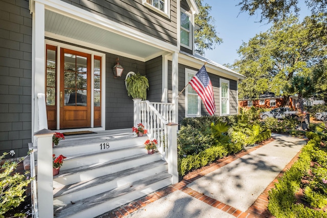 entrance to property with covered porch