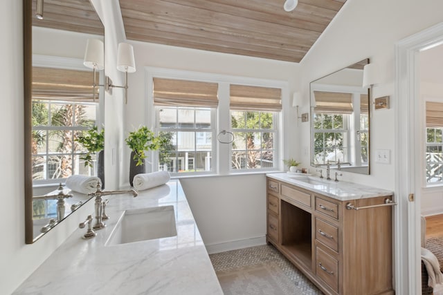 bathroom featuring vanity, baseboards, lofted ceiling, wood ceiling, and tile patterned floors