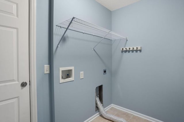 426 Colony Dr, Ridgeland, SC 29936 - clothes washing area featuring hookup for an electric dryer, hookup for a washing machine, and light tile patterned flooring
