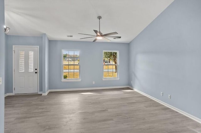 426 Colony Dr, Ridgeland, SC 29936 - spare room with light wood-type flooring, ceiling fan, and lofted ceiling