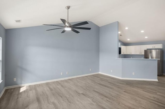426 Colony Dr, Ridgeland, SC 29936 - unfurnished living room with light wood-type flooring, ceiling fan, and lofted ceiling