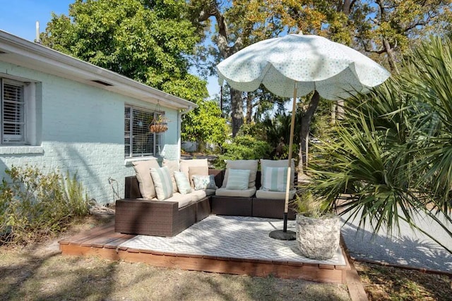 view of patio featuring an outdoor living space and a deck