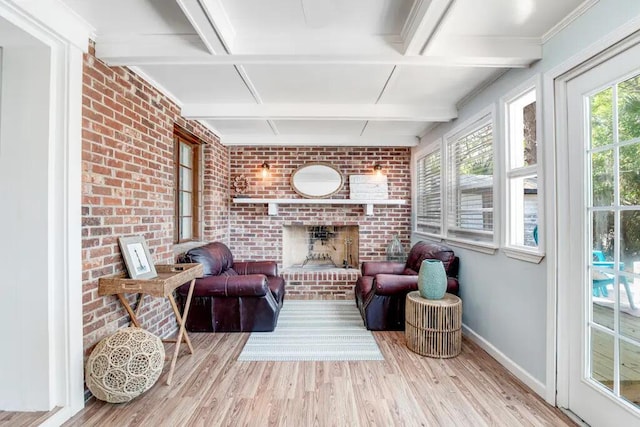 sunroom / solarium featuring beamed ceiling and coffered ceiling