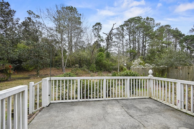 view of patio featuring fence