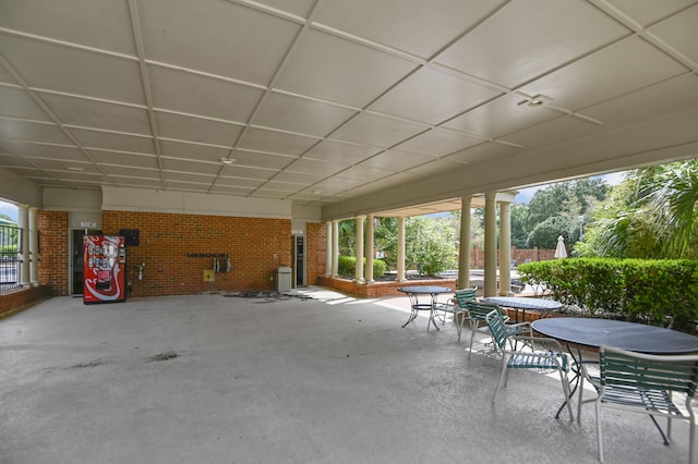 view of patio featuring outdoor dining area