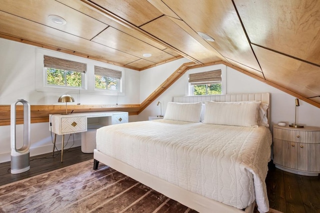 bedroom featuring wood-type flooring and lofted ceiling