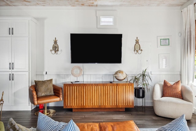 living room with wainscoting and wood finished floors