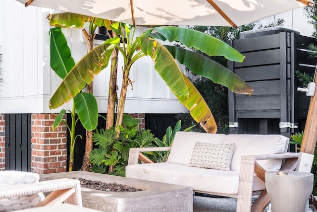 balcony with an outdoor fire pit