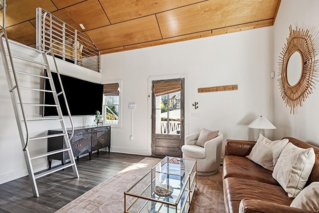 living area with wood finished floors, baseboards, and wood ceiling