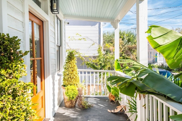 wooden deck featuring a porch