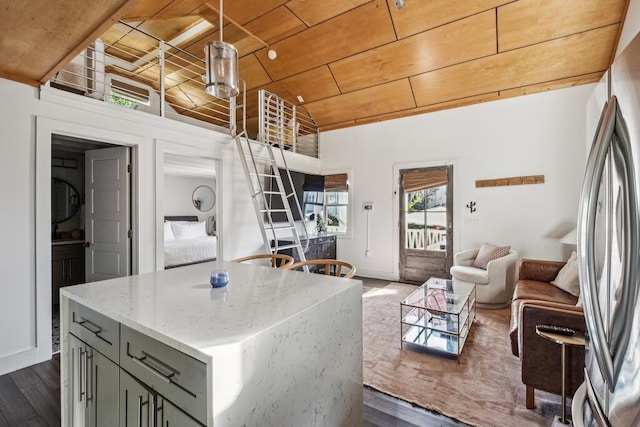 kitchen with wood ceiling, gray cabinets, open floor plan, freestanding refrigerator, and dark wood-style flooring