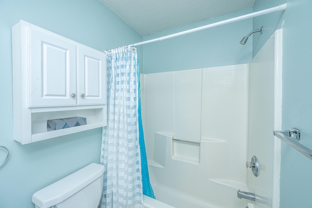full bathroom with shower / tub combo with curtain, a textured ceiling, and toilet
