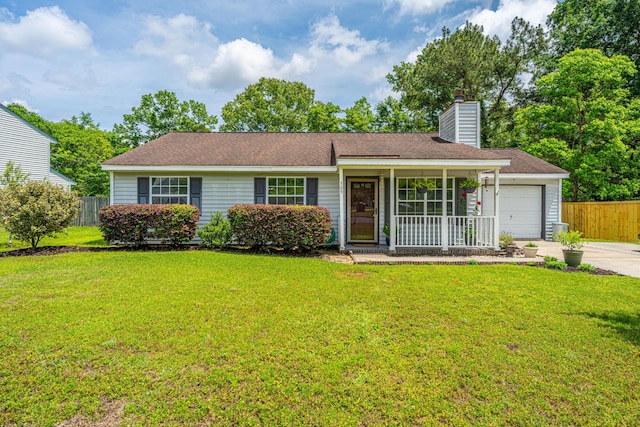single story home featuring concrete driveway, an attached garage, fence, and a front lawn