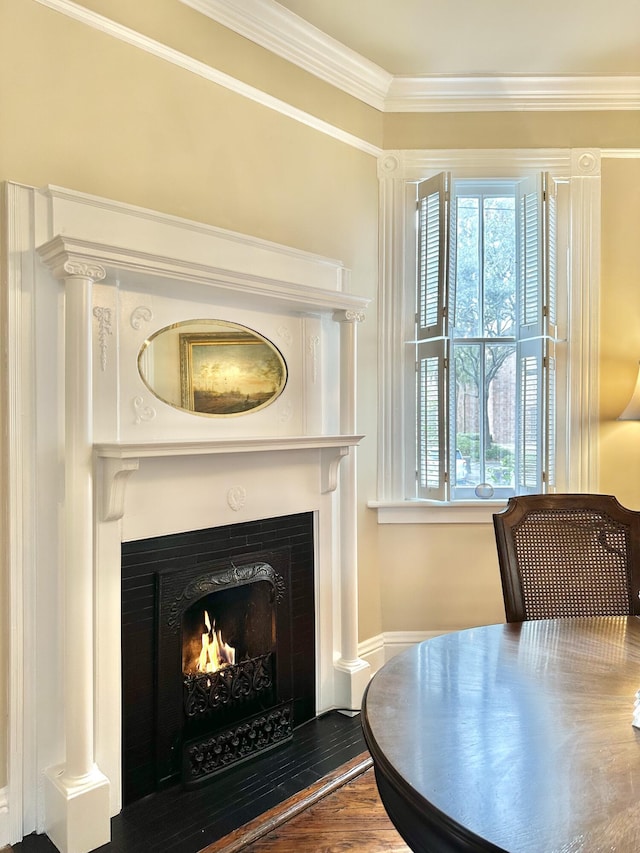 interior space featuring crown molding and hardwood / wood-style flooring