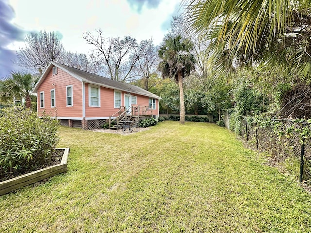 view of yard featuring a deck